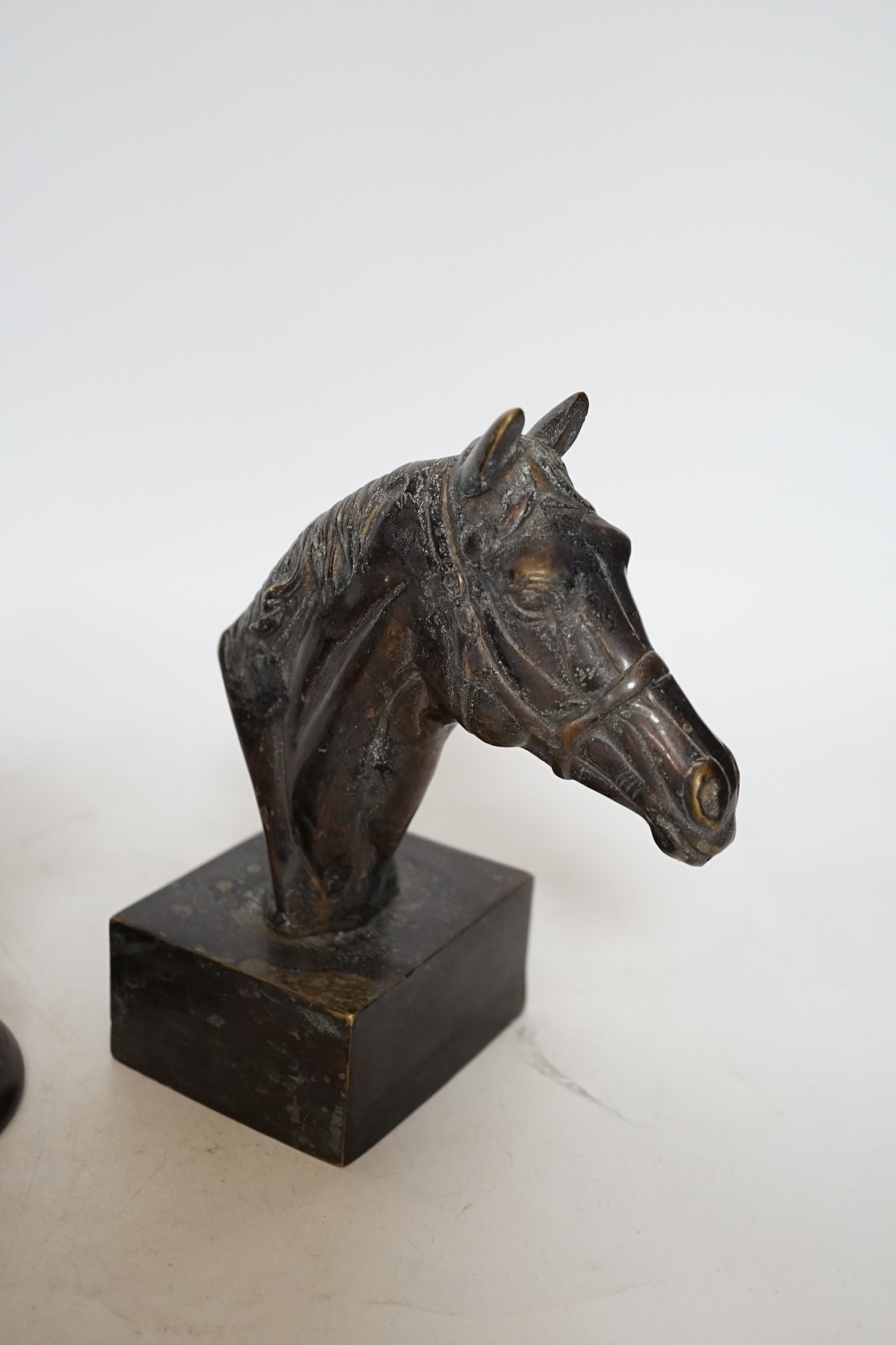 A decorative bronze study of a horse head and a spelter figural fragment, tallest 18.5cm